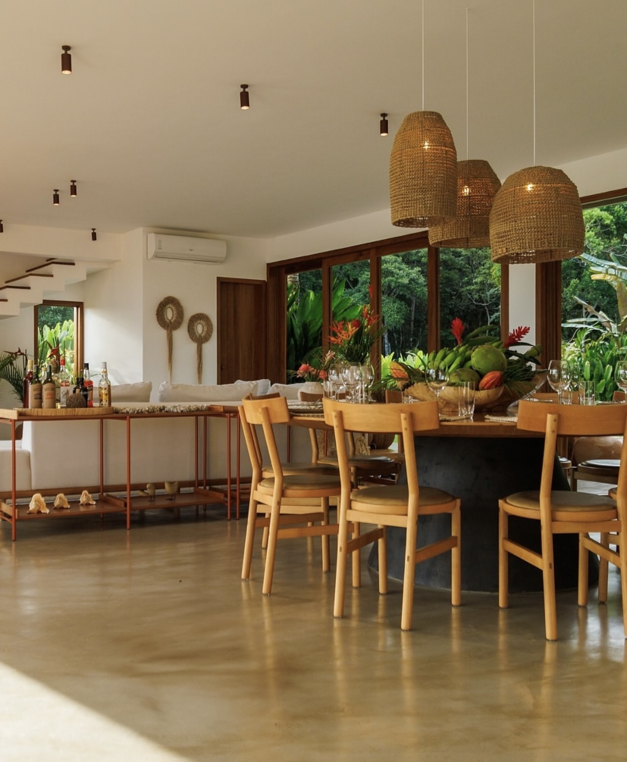 Natural-toned open-plan living and dining interior — existing INCISE Microtopping gallery